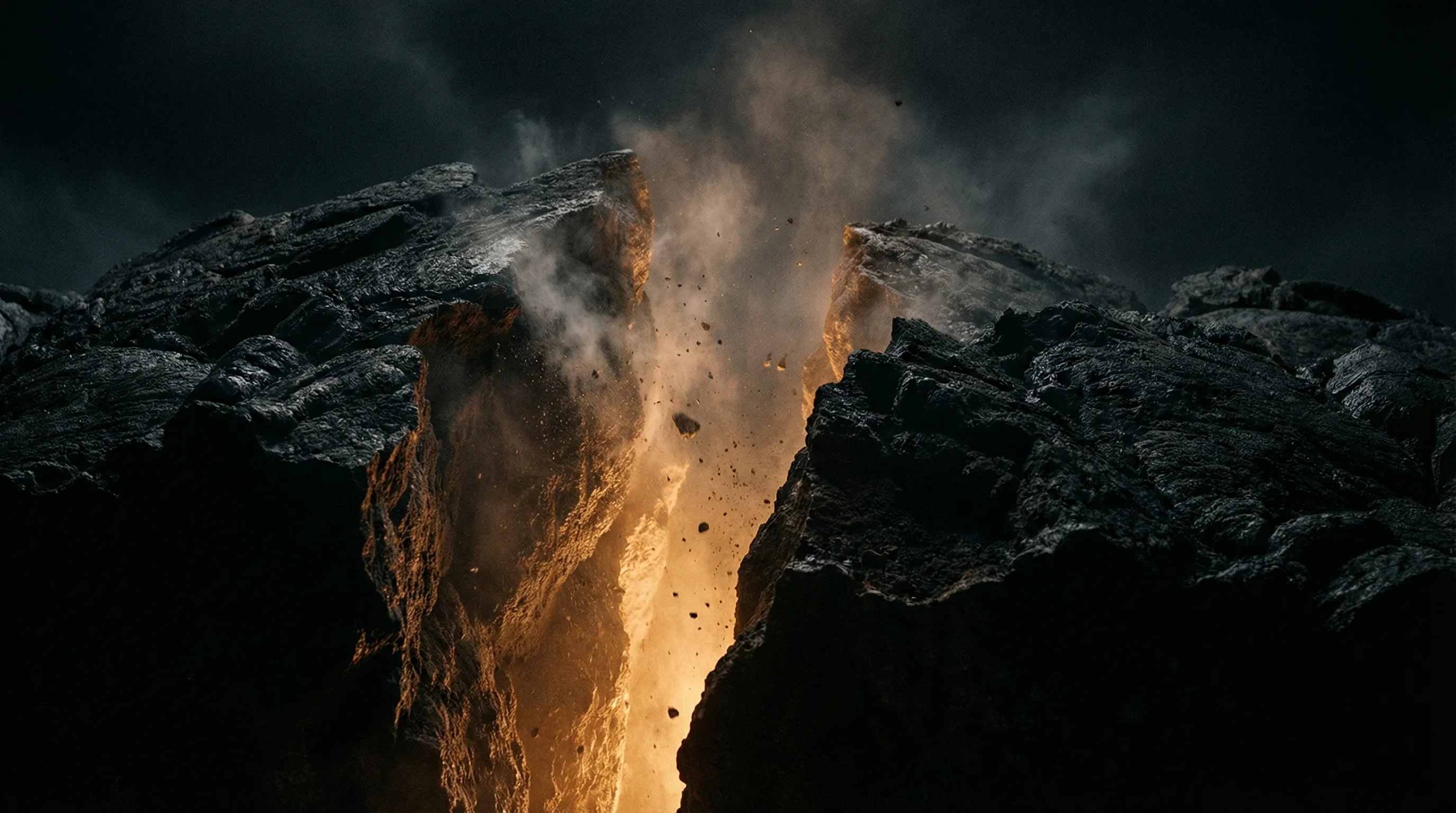Two massive dark stone tectonic plates pulling apart, molten amber light erupting from the deep rift between them, dust and debris suspended in dramatic moody lighting